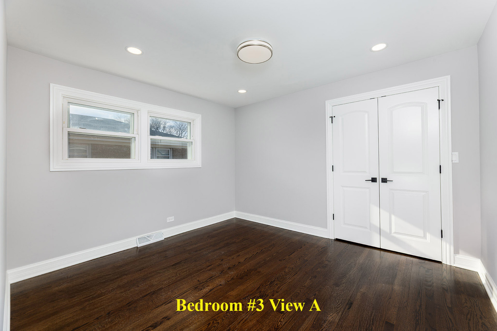 4955 North Delphia Avenue Norridge, IL 60706 - Photo 21 of 36 a view of an empty room with wooden floor