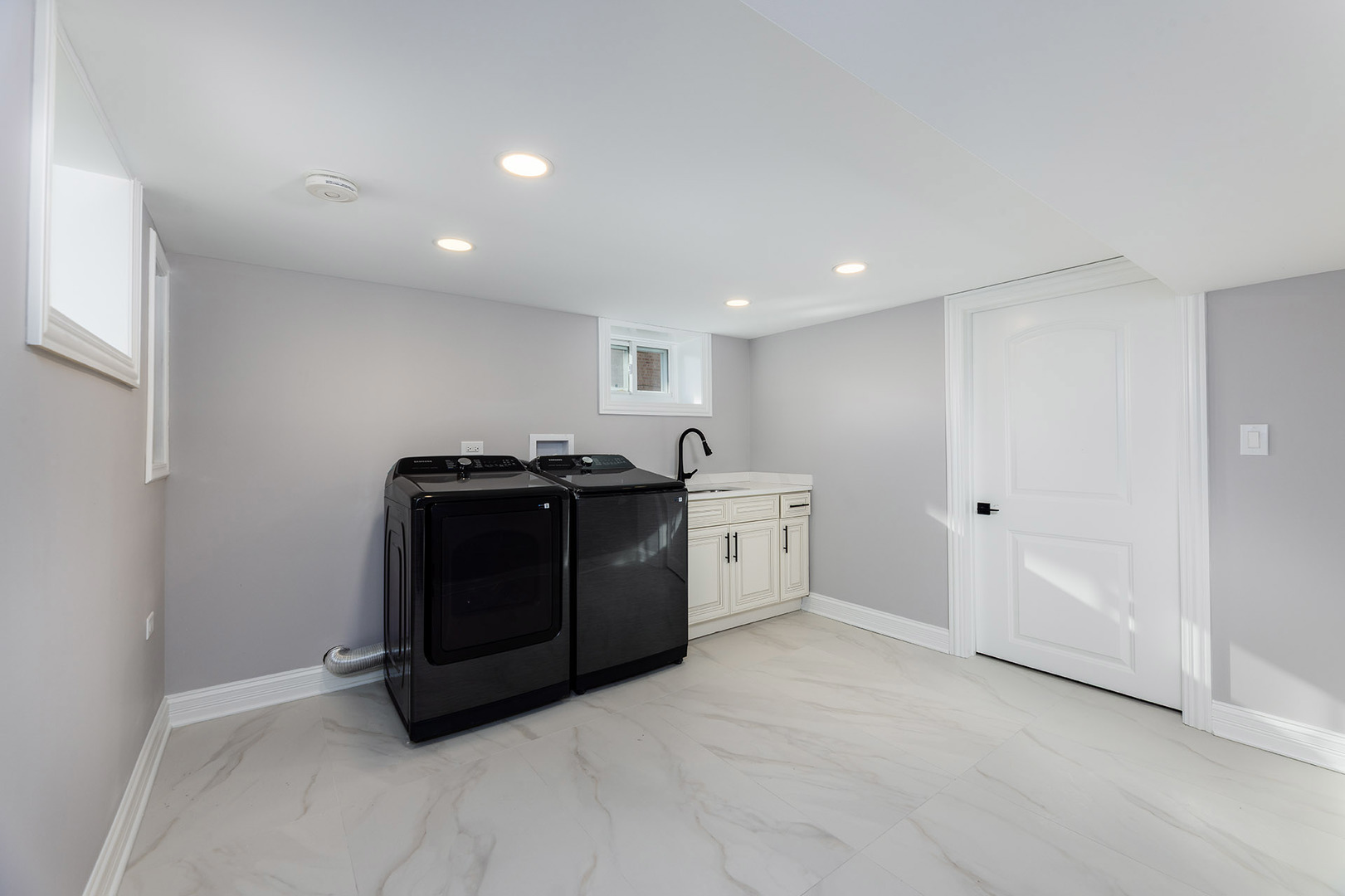 4955 North Delphia Avenue Norridge, IL 60706 - Photo 31 of 36 a utility room with sink dryer and washer