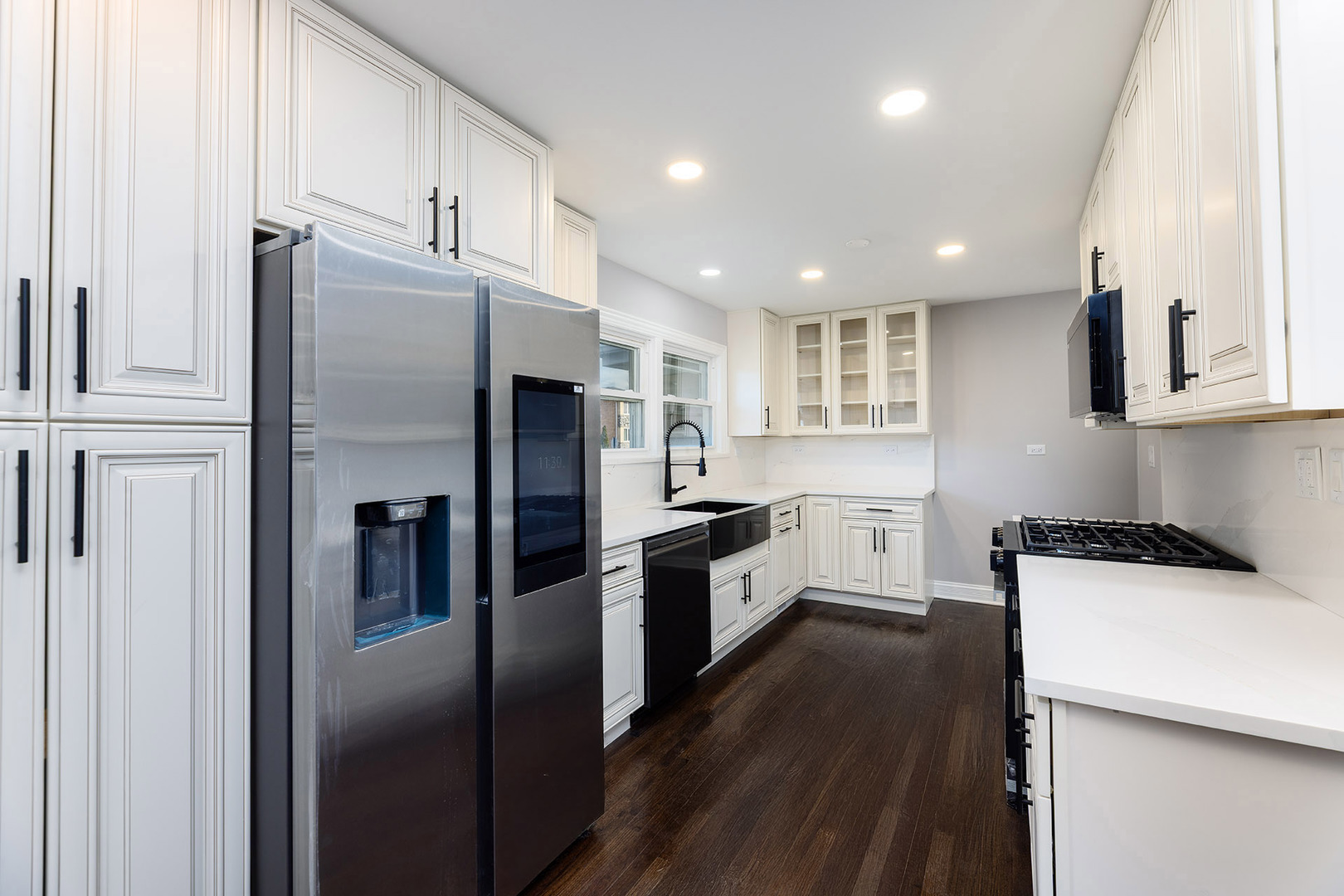 4955 North Delphia Avenue Norridge, IL 60706 - Photo 10 of 36 a kitchen with stainless steel appliances a refrigerator sink and microwave