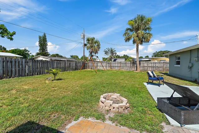 a view of a backyard with a garden