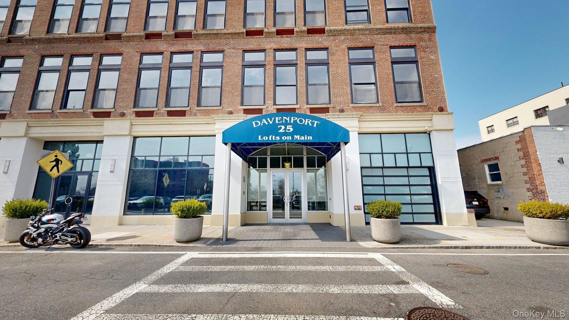 25 Leroy Place, Unit 509 New Rochelle, NY 10805 - Photo 1 of 12 a front view of a building with sitting area