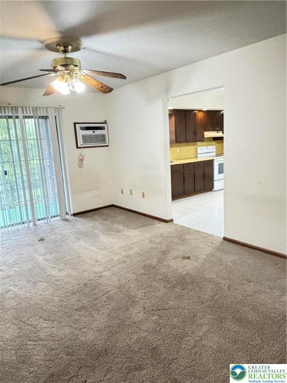 2027 Willow Park Road, Unit 7 Bethlehem, PA 18020 - Photo 10 of 27 an empty room with windows and ceiling fan