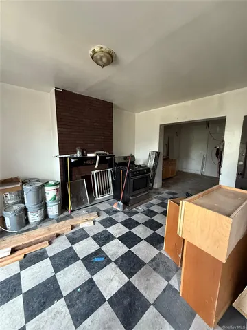 a room with furniture and a rug