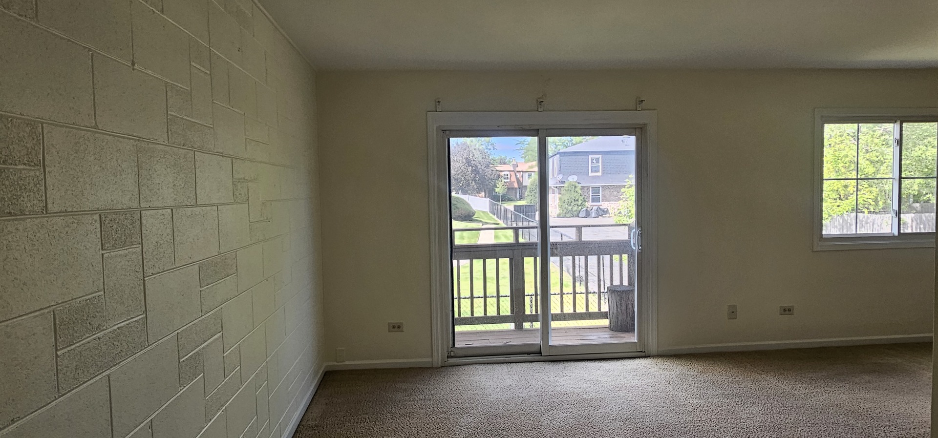 833 Village Quarter Road, Unit A3 West Dundee, IL 60118 - Photo 3 of 27 a view of an empty room with a window