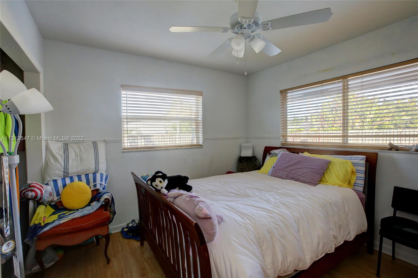 6681 Peters Road Plantation, FL 33317 - Photo 15 of 27 a bedroom with bed and a window