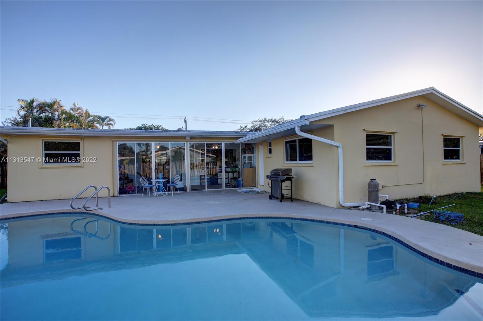 6681 Peters Road Plantation, FL 33317 - Photo 23 of 27 a front view of a house with sitting area