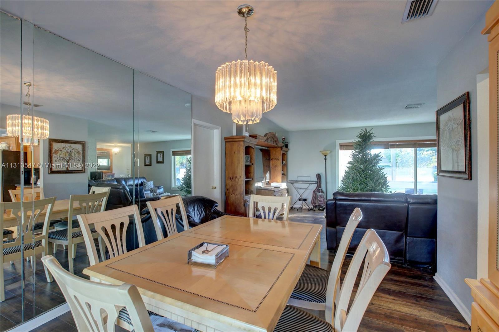 6681 Peters Road Plantation, FL 33317 - Photo 6 of 27 a view of a dining room with furniture window and outside view