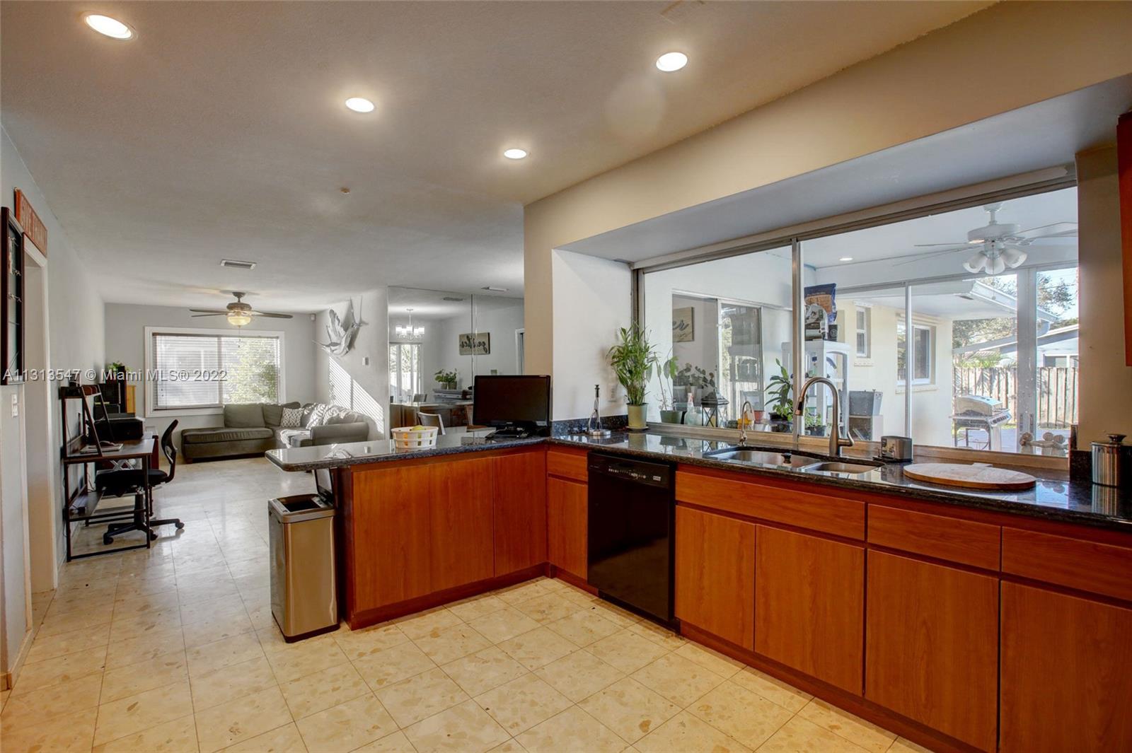 6681 Peters Road Plantation, FL 33317 - Photo 10 of 27 a kitchen with lots of counter top space