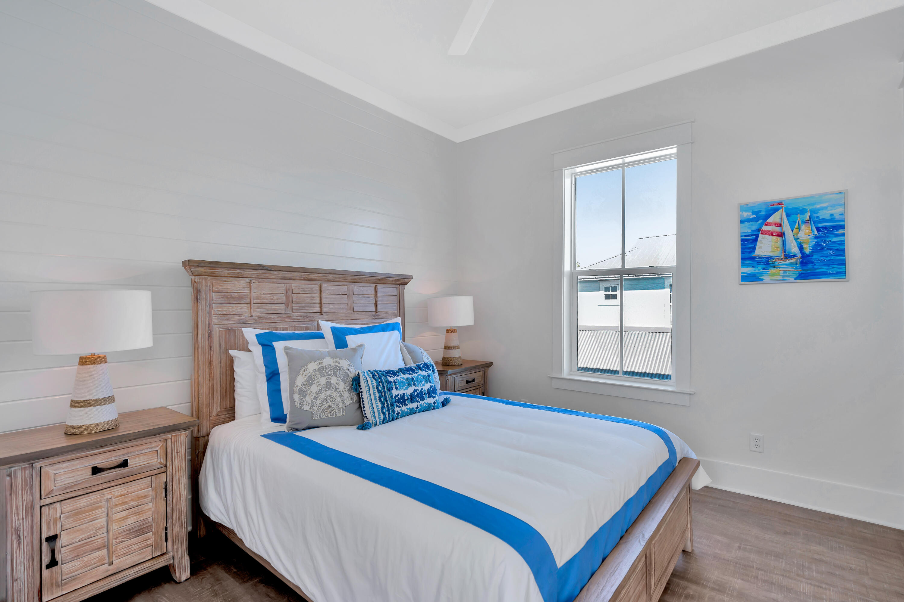 267 Beach Bike Way Inlet Beach Inlet Beach, FL 32461 - Photo 24 of 37 a bedroom with a large bed and a window