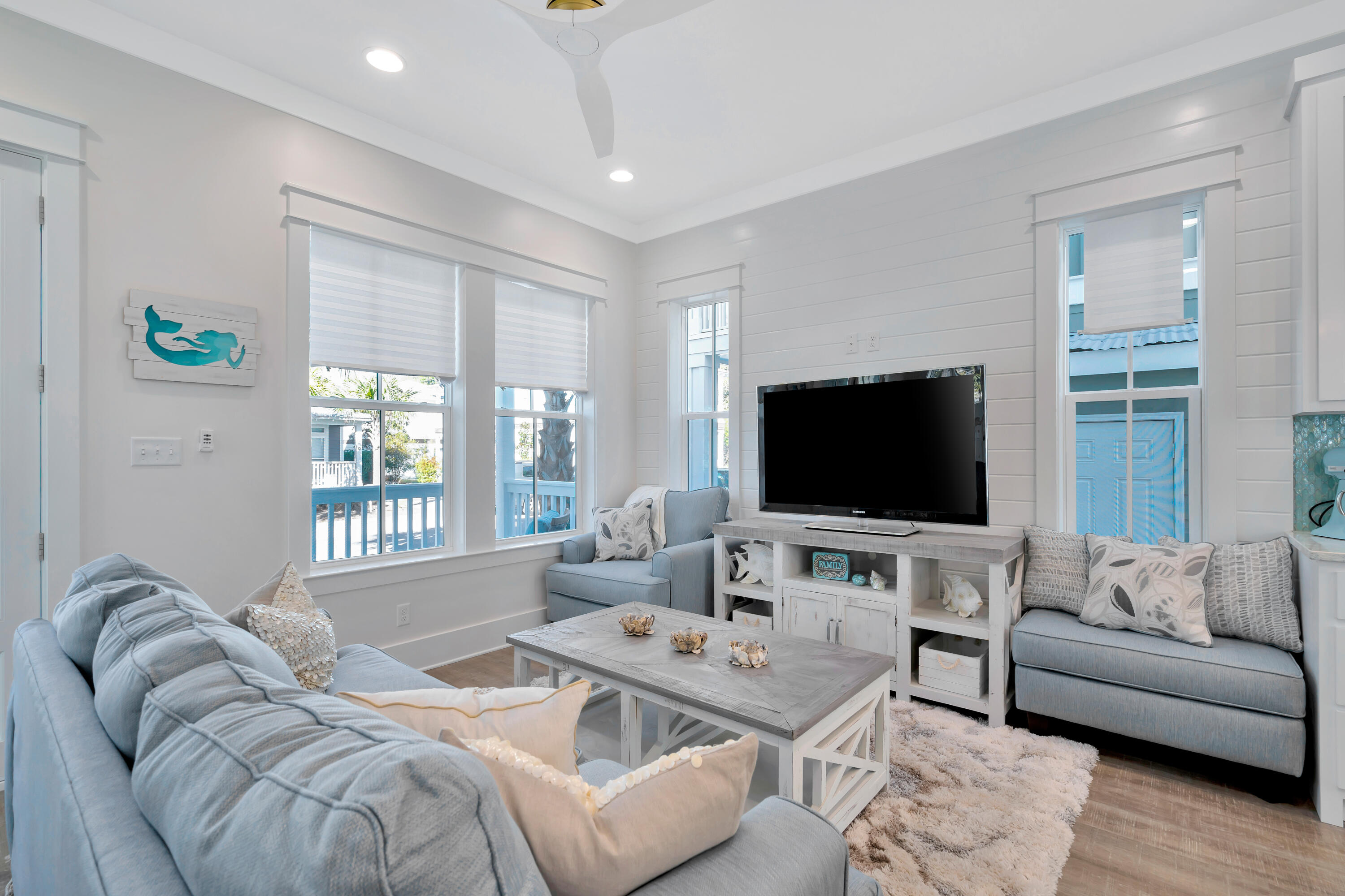 267 Beach Bike Way Inlet Beach Inlet Beach, FL 32461 - Photo 5 of 37 a living room with furniture and a flat screen tv