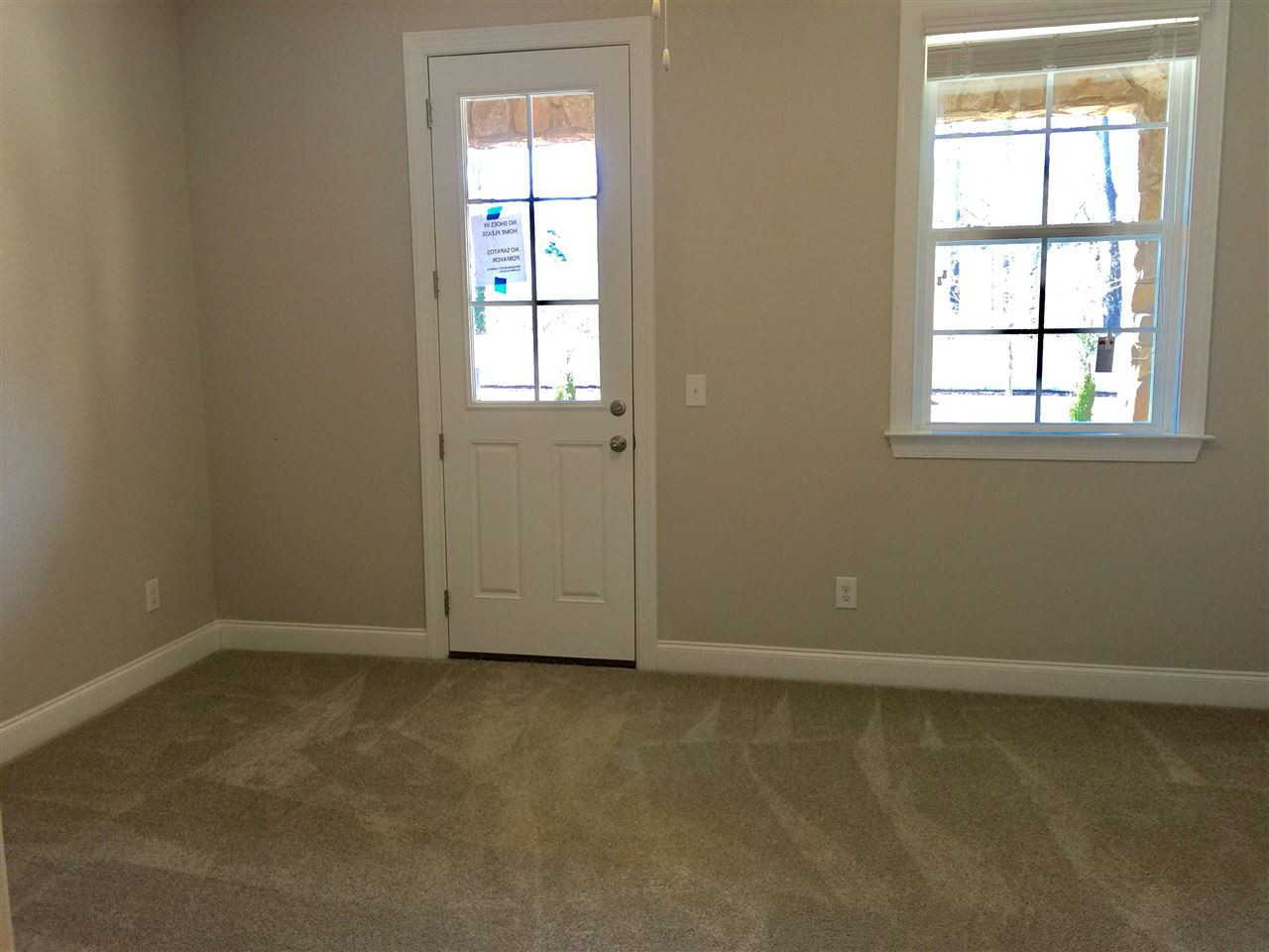 863 Wake Towne Drive, Unit 22 Raleigh, NC 27609 - Photo 22 of 25 1st floor flex space , perfect for a guest bedroom or office Bedroom