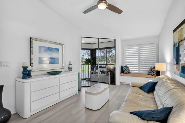 a bed room with a bed and a lamp