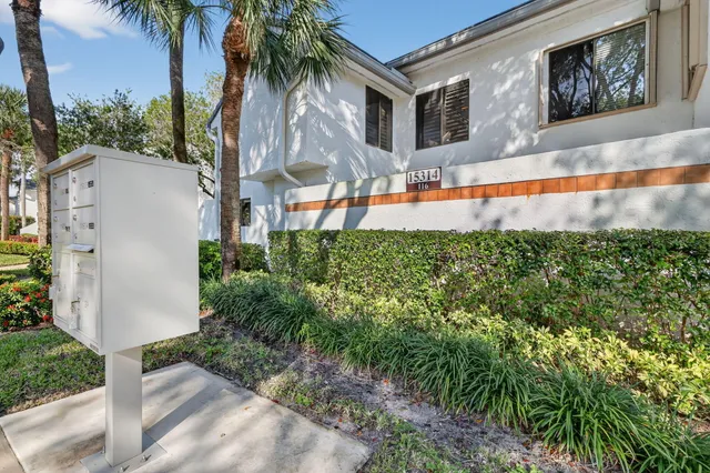a view of a lake with couches and ocean view