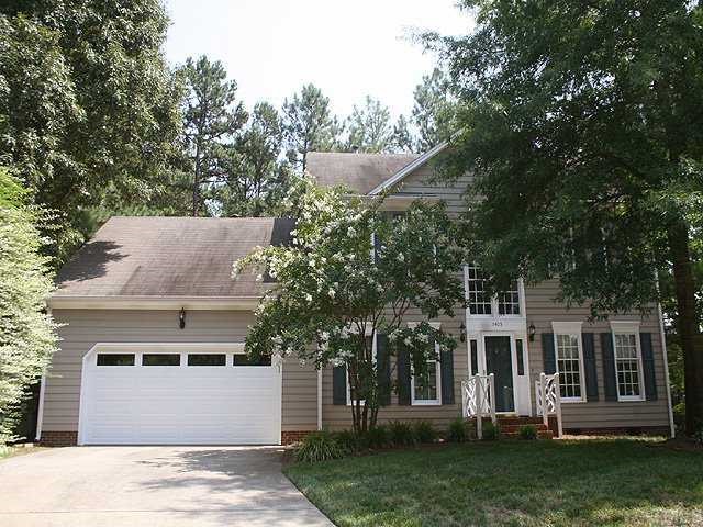 5405 Islehurst Court Raleigh, NC 27613 - Photo 1 of 12 front view of a house with a yard