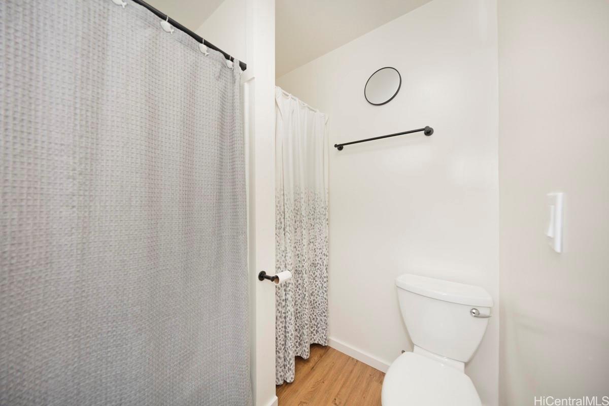 18-2274 Laulea Road Volcano, HI 96785 - Photo 10 of 15 Full-size bathtub and shower combination with additional storage space for everyday use