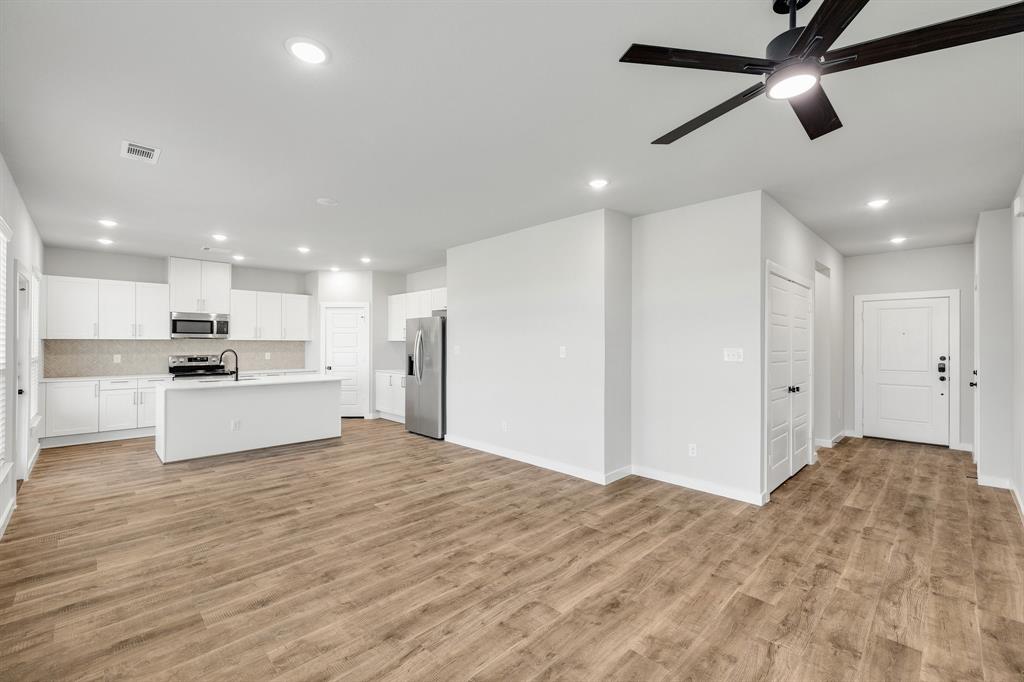 7050-7052 Guilford Road Midlothian, TX 76065 - Photo 36 of 36 a view of kitchen with refrigerator and microwave