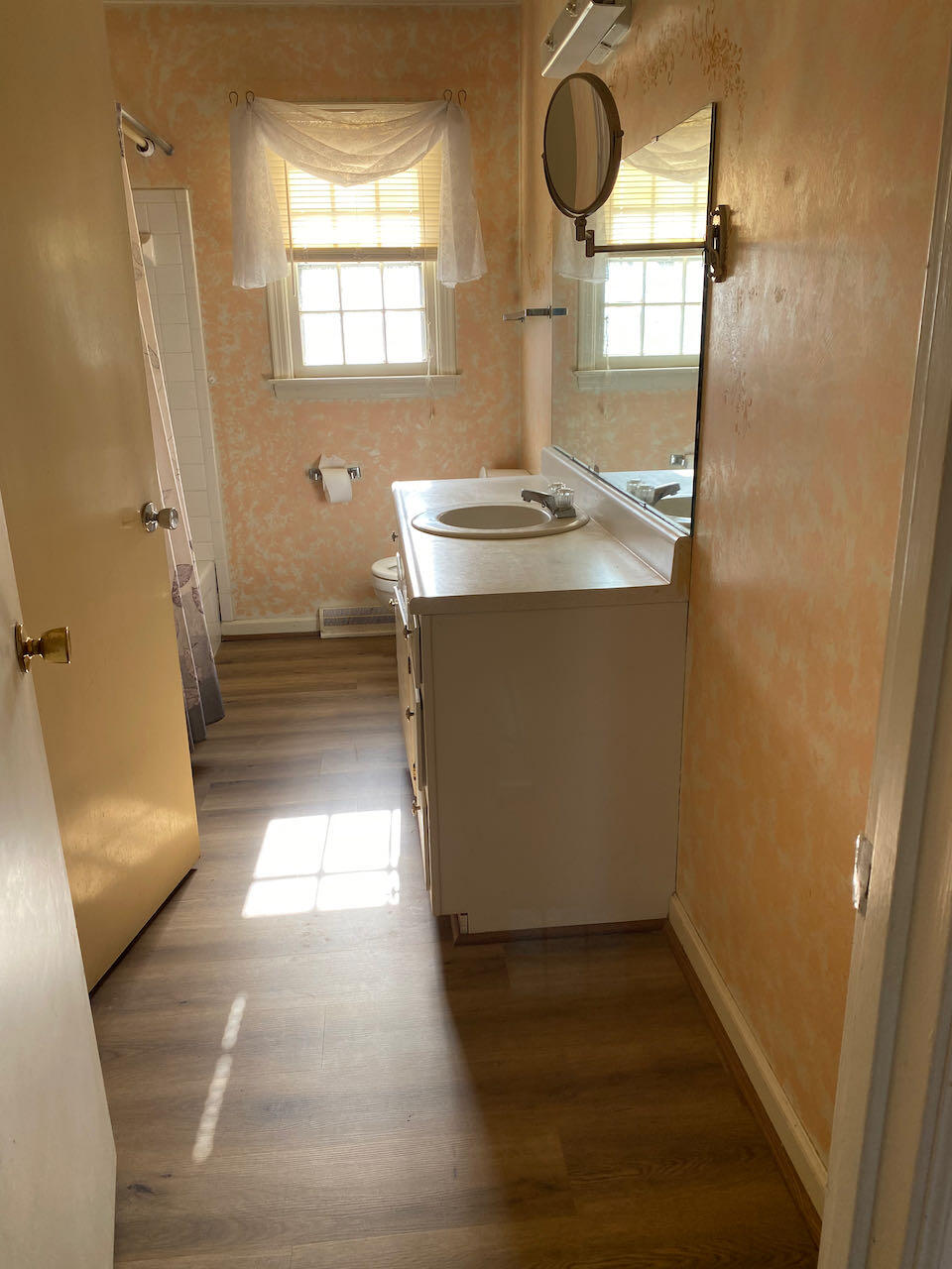 610 Olney Road Vinton, VA 24179 - Photo 15 of 42 a bathroom with a sink and a mirror