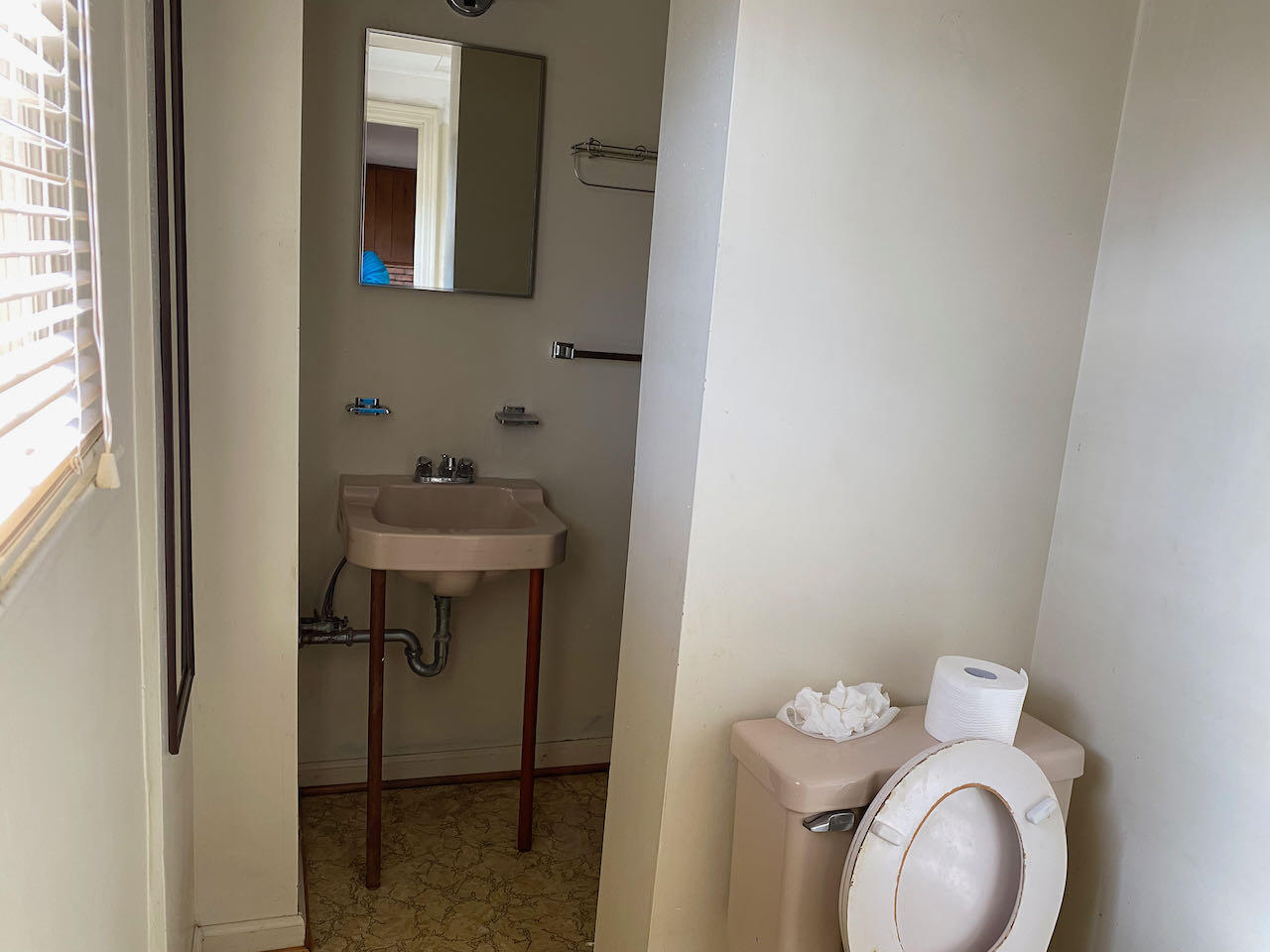 610 Olney Road Vinton, VA 24179 - Photo 27 of 42 a bathroom with a toilet sink and mirror