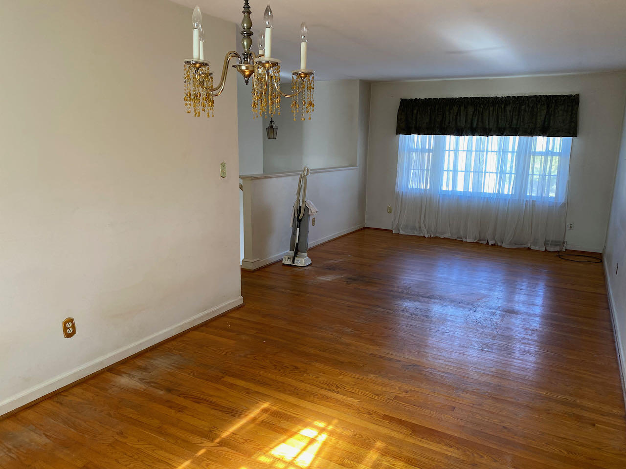 610 Olney Road Vinton, VA 24179 - Photo 7 of 42 an empty room with wooden floor and windows