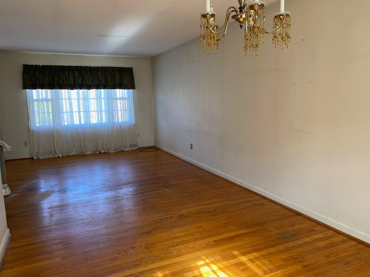 610 Olney Road Vinton, VA 24179 - Photo 8 of 42 an empty room with wooden floor and windows