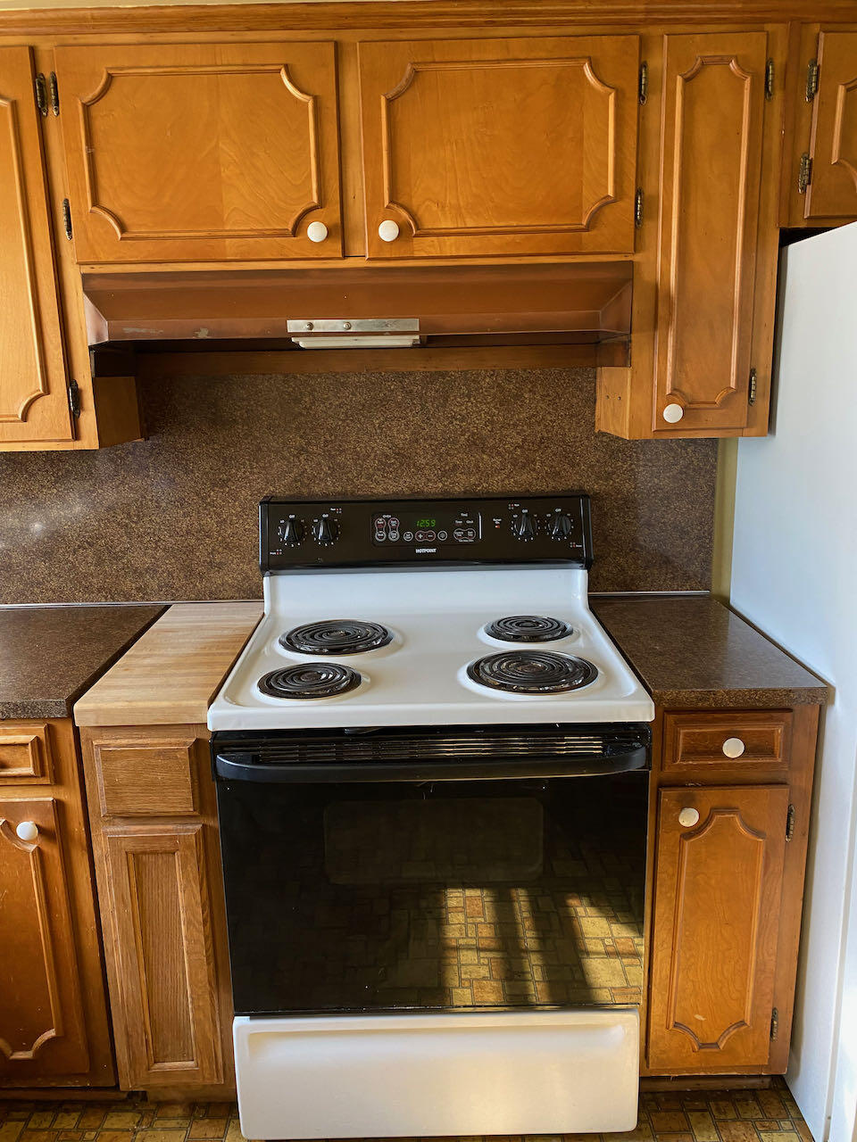 610 Olney Road Vinton, VA 24179 - Photo 10 of 42 a stove top oven sitting inside of a kitchen