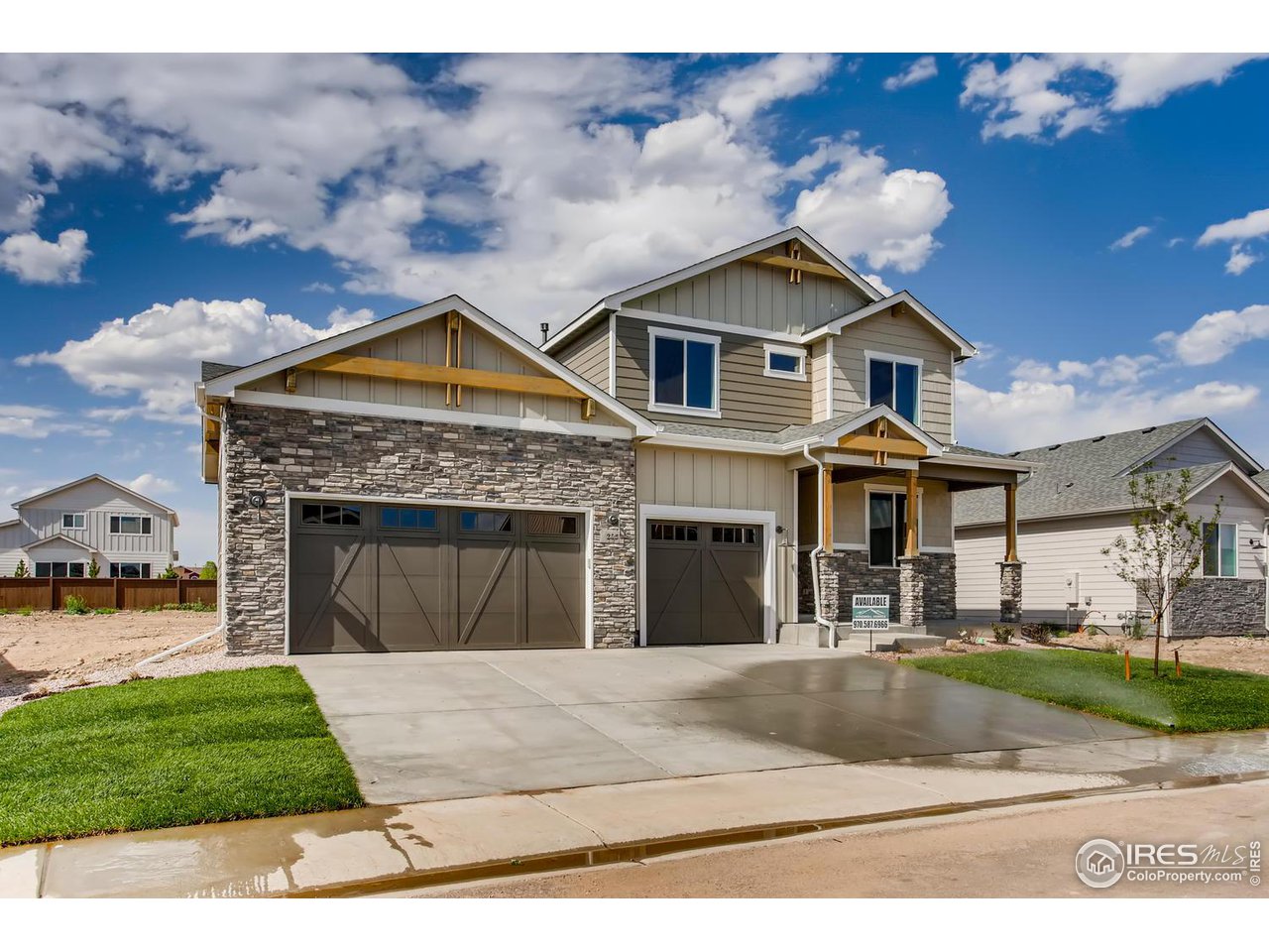 822 Canoe Birch Drive Windsor, CO 80550 - Photo 2 of 14 a front view of a house with a yard