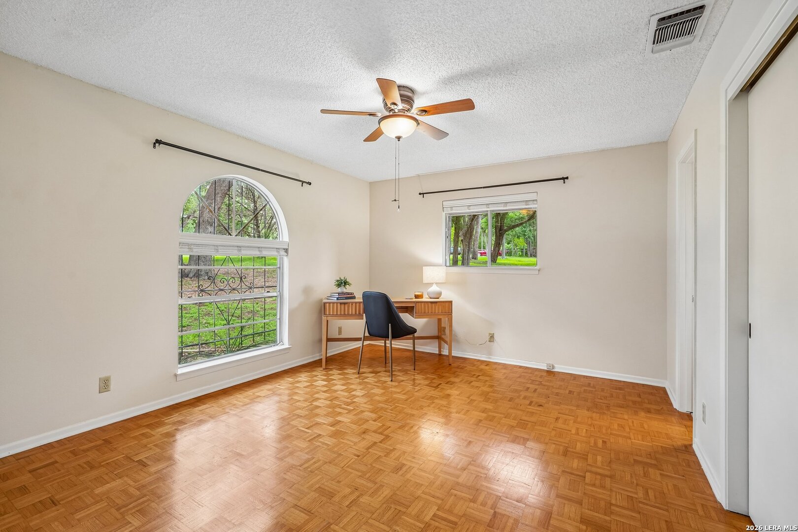 20632 Timber Rose Drive Garden Ridge, TX 78266 - Photo 24 of 46 a view of a livingroom with a window and a ceiling fan