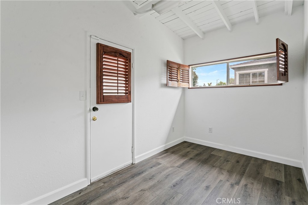 6786 Delta Avenue Long Beach, CA 90805 - Photo 8 of 16 a view of empty room with wooden floor