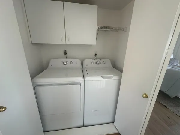 a utility room with dryer and washer