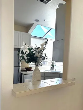 a vase of flowers sitting on a table
