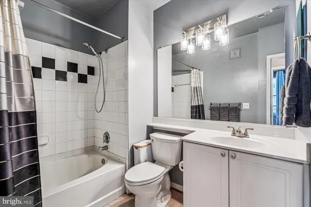 a view of a hallway with washer and dryer