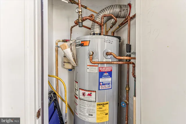 a work room with furniture and wooden floor