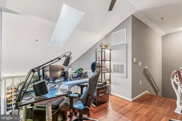 a view of a wooden door with a bench