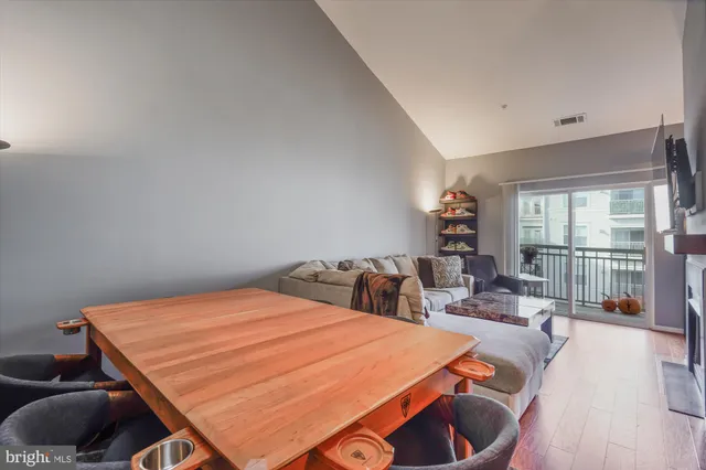 a bed room with a bed and a large window