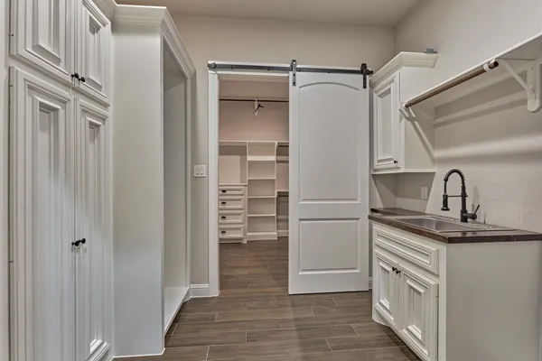 a view of a bathroom from the hallway