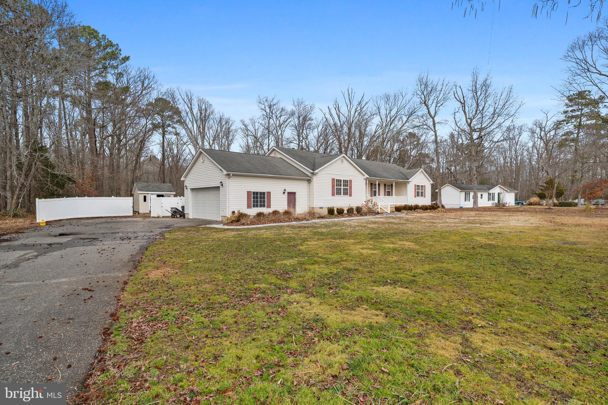 22343 Newtowne Neck Road Leonardtown, MD 20650 - Photo 1 of 40 Long driveway with sideload garage.