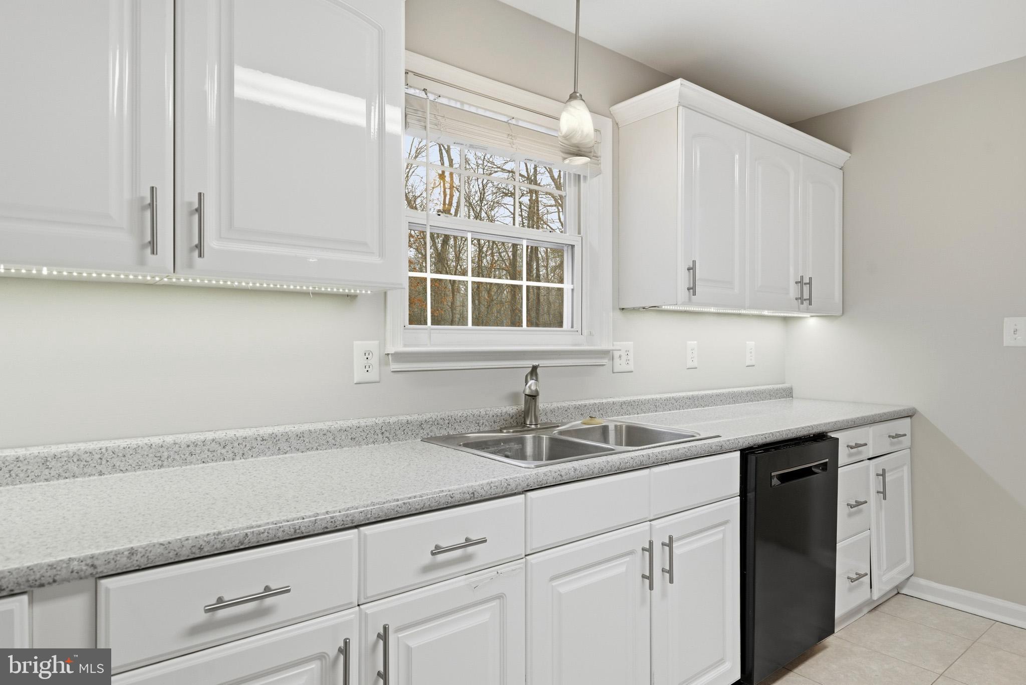 22343 Newtowne Neck Road Leonardtown, MD 20650 - Photo 17 of 40 Lovely kitchen window to bring in the light.