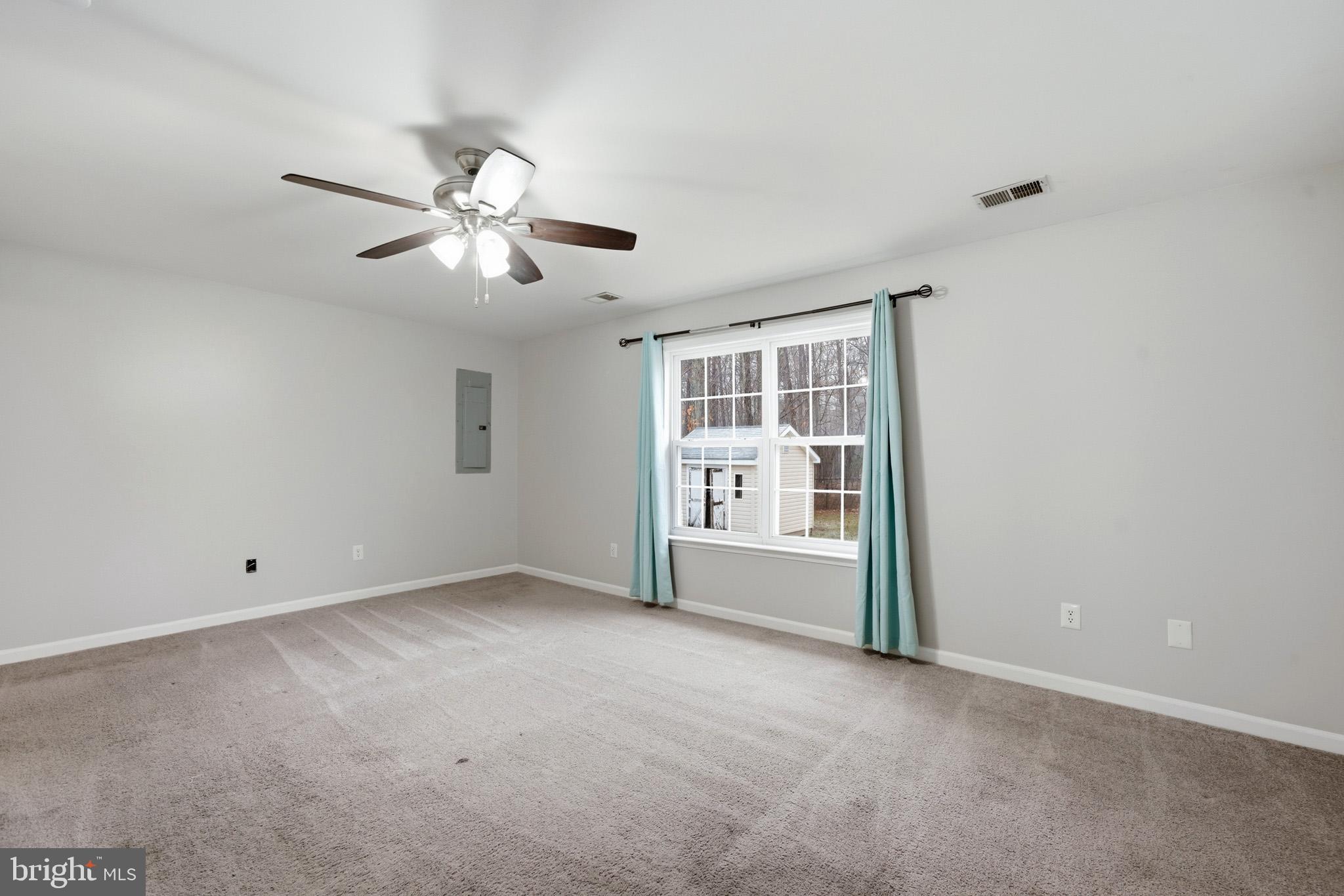 22343 Newtowne Neck Road Leonardtown, MD 20650 - Photo 23 of 40 Primary bedroom offers lots of room and light.