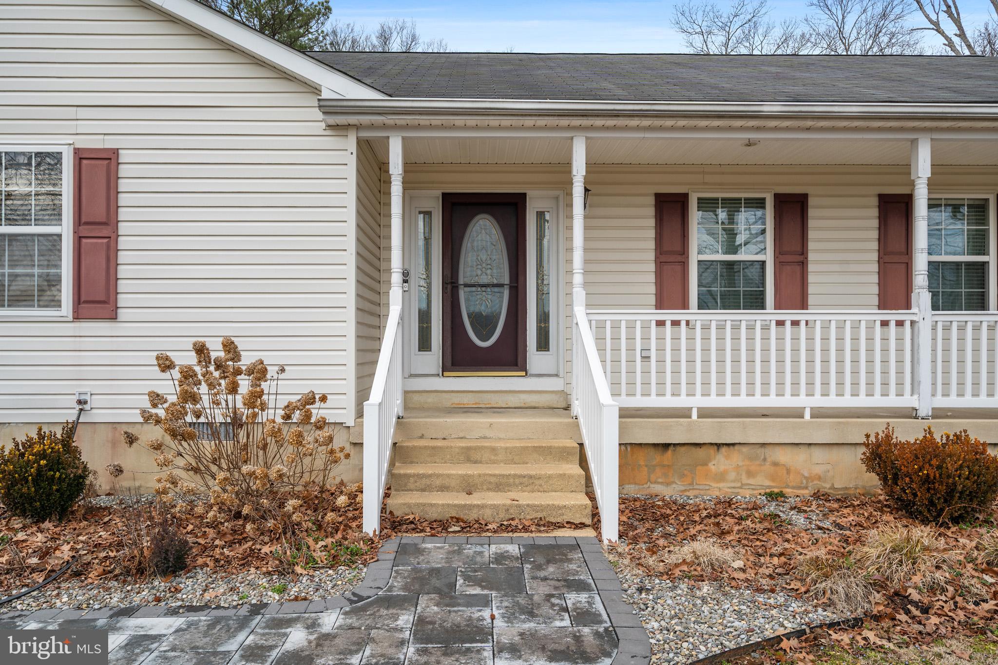 22343 Newtowne Neck Road Leonardtown, MD 20650 - Photo 4 of 40 Charming front porch welcomes you and your guests.