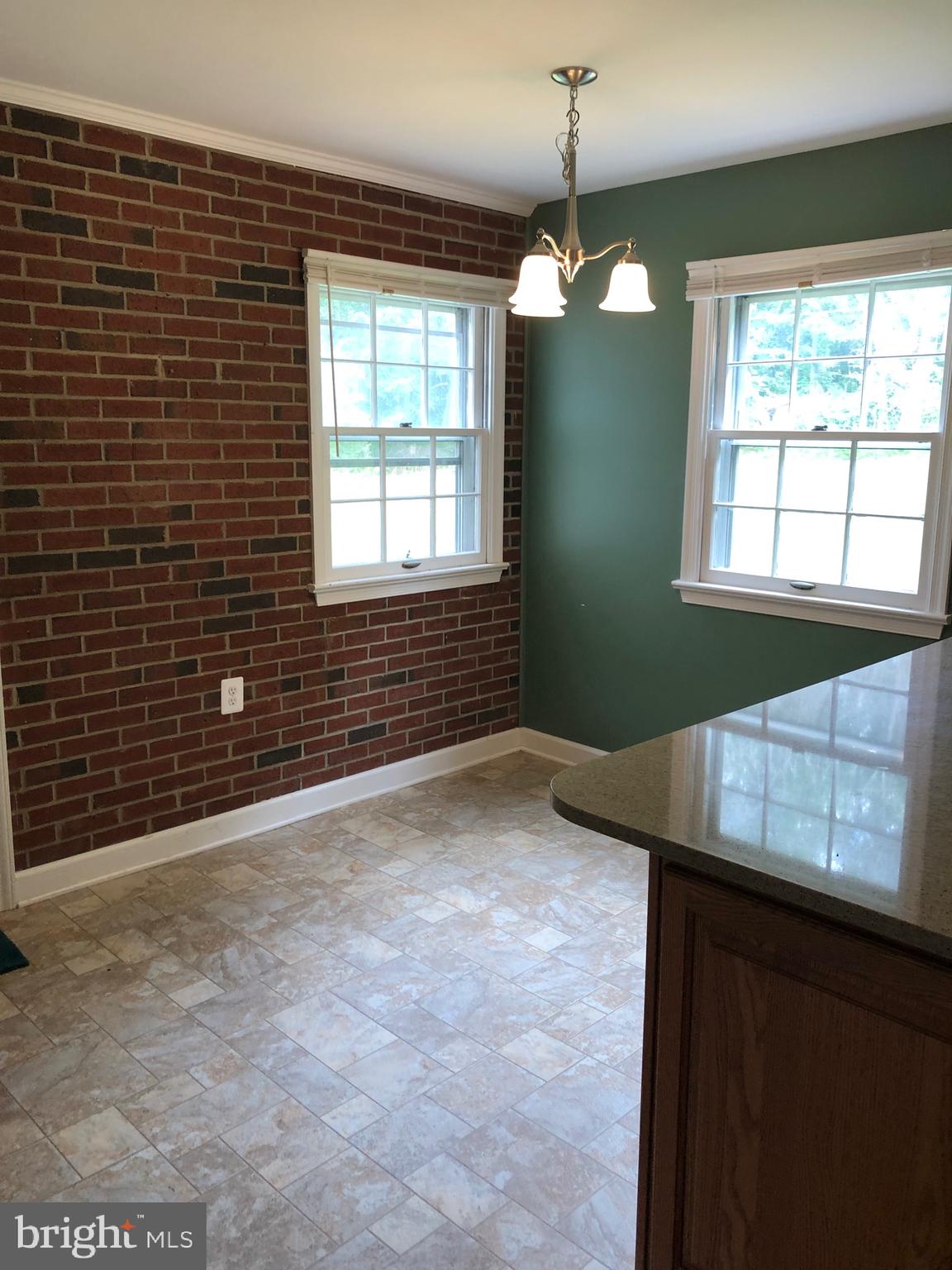 6219 Quinn Road Frederick, MD 21701 - Photo 6 of 26 Table space off kitchen