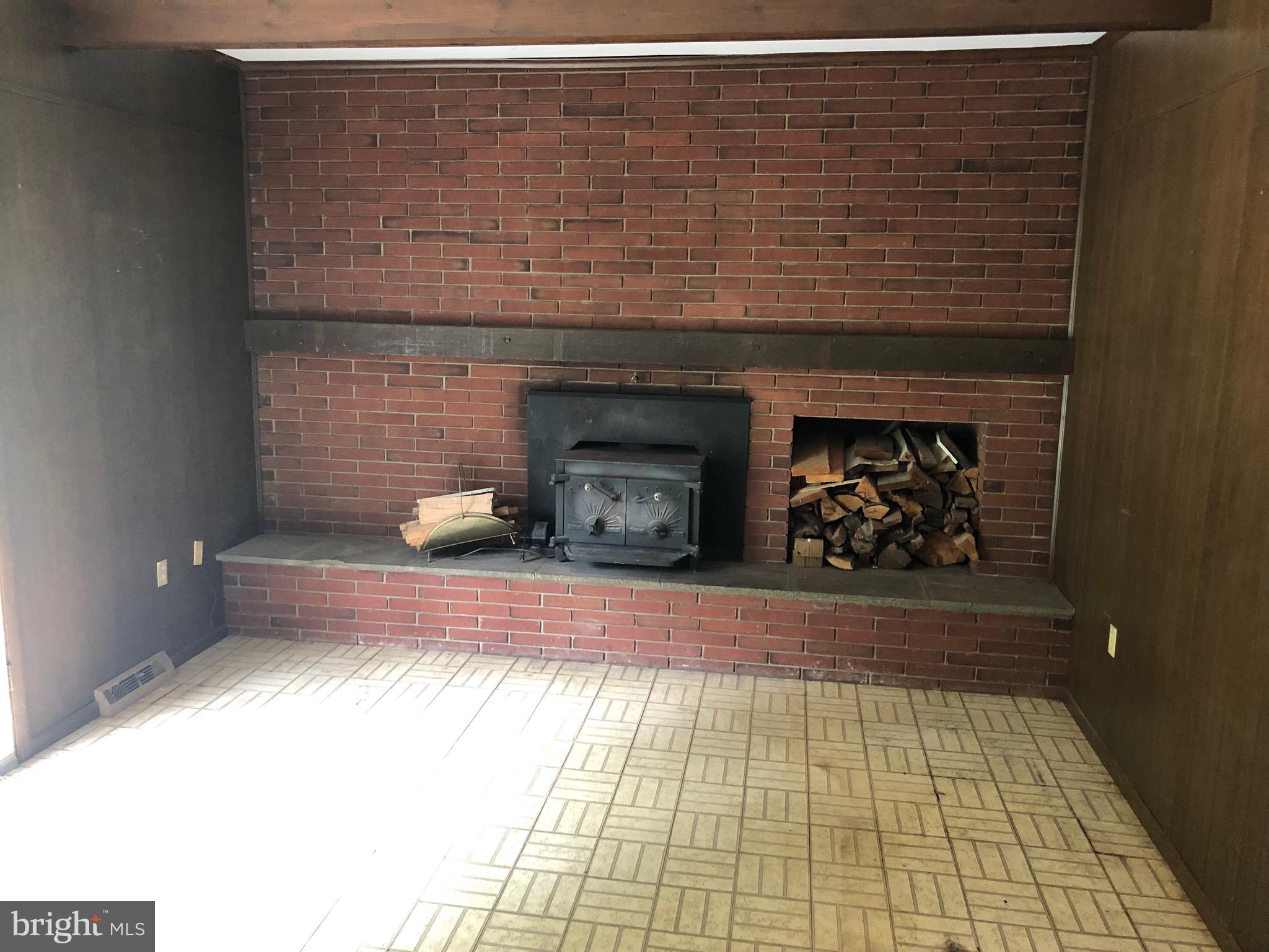6219 Quinn Road Frederick, MD 21701 - Photo 7 of 26 Wood stove in family room