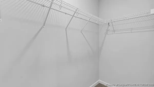 a view of a room with racks on the wall