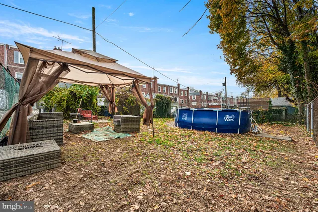 a view of a chairs and tables in the patio