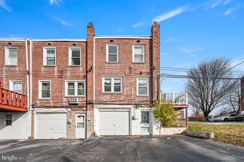 a front view of a building with a street