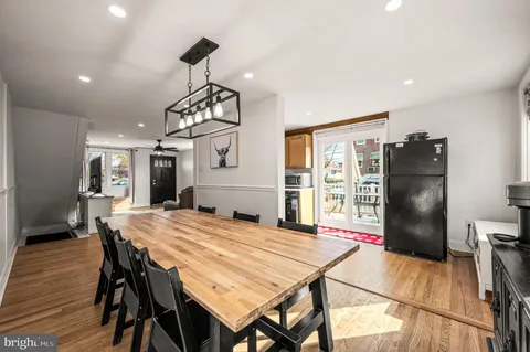 a very nice looking dining room with a table and chairs
