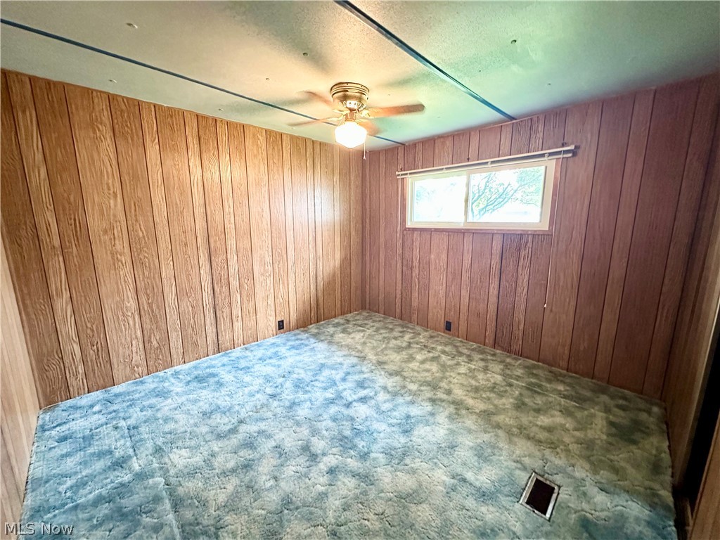 28 Richter Road Colliers, WV 26035 - Photo 12 of 38 Bedroom featuring ceiling fan and carpet flooring