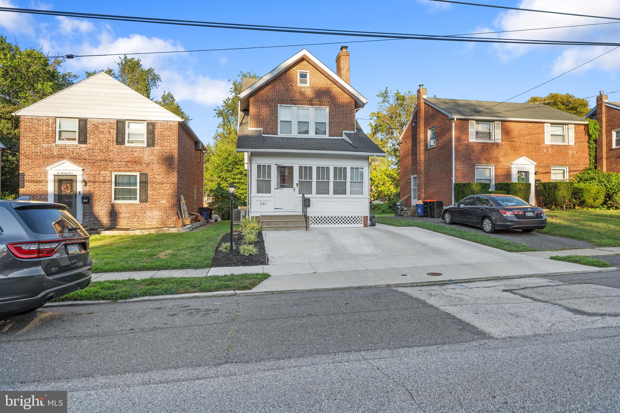 261 East Avon Road Brookhaven, PA 19015 - Photo 1 of 34 front view of a house with a street