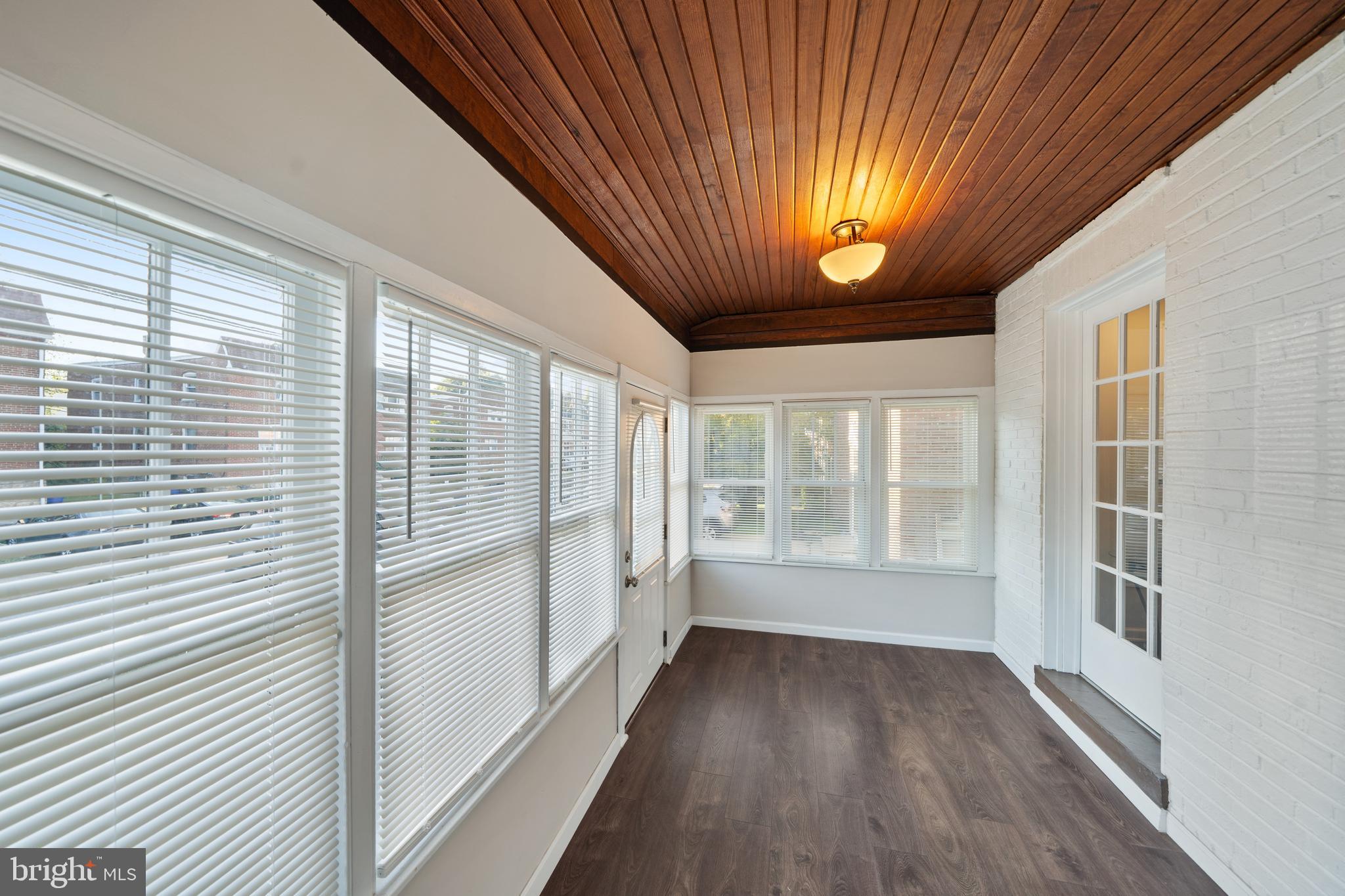261 East Avon Road Brookhaven, PA 19015 - Photo 6 of 34 a view of an empty room with a window