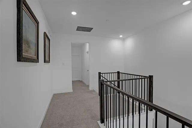 a view of hallway with stairs