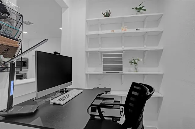 a room with furniture and a flat screen tv